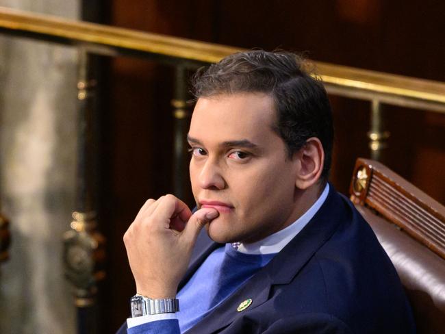 In this file photo taken on January 3, 2023, newly elected Republican Representative from New York, George Santos, looks on as the US House of Representatives convenes for the 118th Congress at the US Capitol in Washington. - The House Ethics Committee opened an investigation into the embattled freshman Representative today. (Photo by Mandel NGAN / AFP)