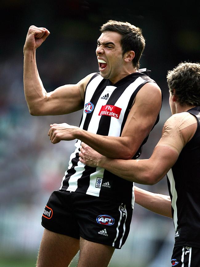 Chris Egan celebrates a goal for Collingwood.