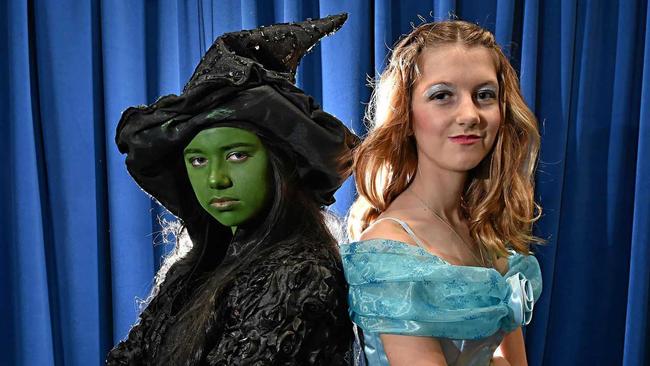 FRENEMIES: Elphaba played by Reese Corner and Galinda, played by Roanna Law. Picture: Warren Lynam