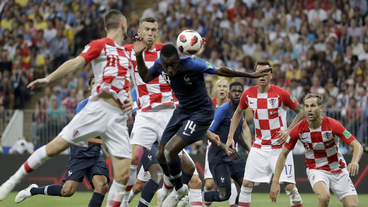 Croatia's Ivan Perisic, second left, touches the ball with his hand.