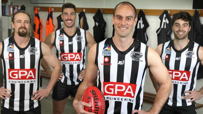 Payneham Norwood Union playing coach Jace Bode, (second right), captain Jonathan Giannini, (second left, and players, Brett Ancell (left), and Anthony Giannini. Picture: Dean Martin