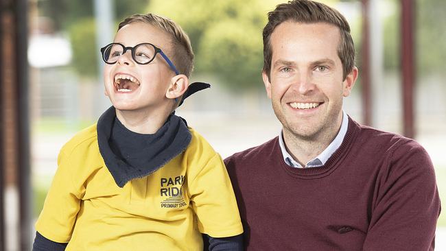 Rowville's Ace Bartlett, 7, with his uncle Daniel Hopper, who is running in the Melbourne Marathon to raise money for Ace to have a new bike. Picture: Ellen Smith