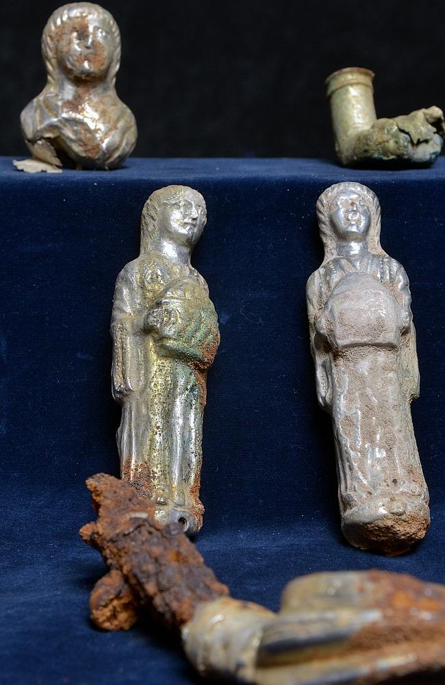 Damaged property ... silver statuettes part of a Roman military commander’s folding chair which was reportedly destroyed during the illegal dig.