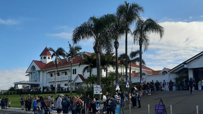 Crowds lining up outside Sea World on its first day back open following the COVID-19 shutdown. Picture: Brianna Morris-Grant.