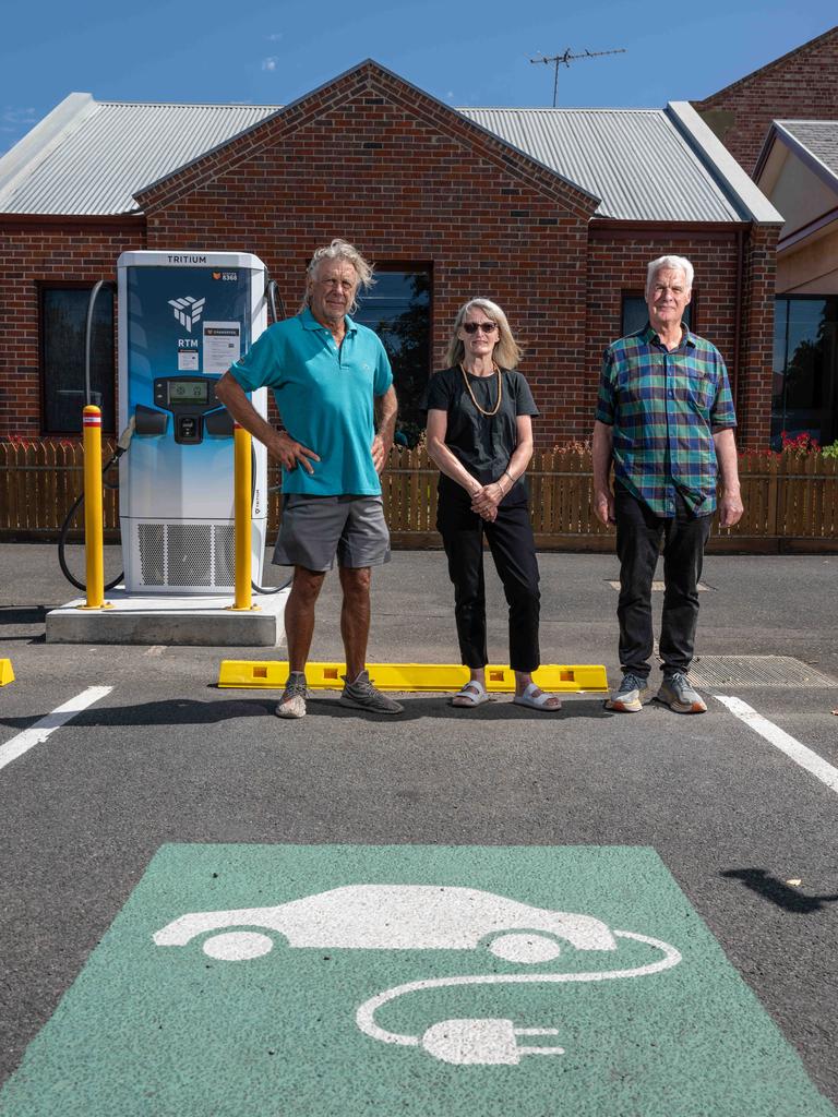 David Connoley, Jo Pitt and David Kenwood say they will continue their fight to move the electric vehicle chargers. Picture: Brad Fleet.