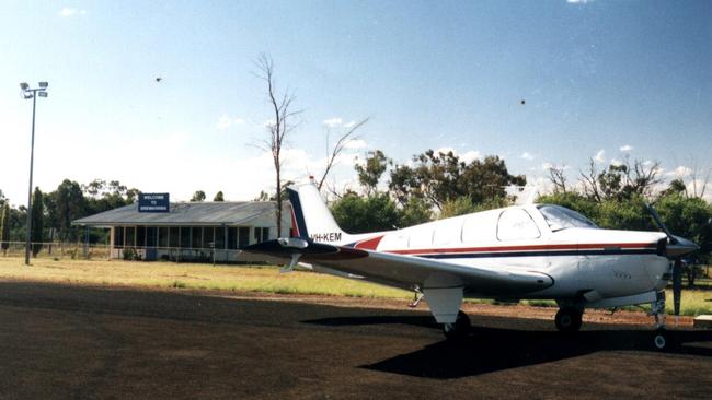 A Navajo twin-engine aircraft sits at Brewarrina Airport on January 20, after two masked men robbed plane of its cargo of mail bags &amp; business deposits leaving pilot and two airport staff handcuffed to fence as robbers left in stolen Commodore. Picture: Greg Keen.