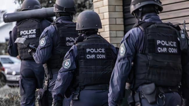 Raptor squad officers raiding a property. Picture: NSW Police