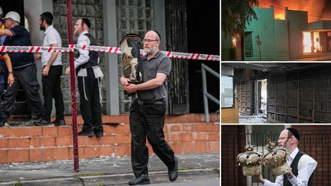 Members of the Jewish community recover items from the Adass Israel Synagogue in Melbourne, following an arson attack. Pictures: Getty Images / David Caird