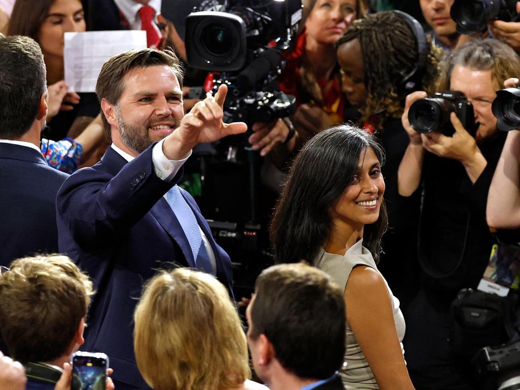 JD Vance and his wife Usha Vance greet attendees during the first day of the 2024 Republican National Convention at the Fiserv Forum in Milwaukee, Wisconsin. Picture: AFP