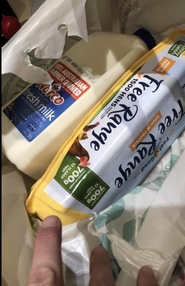 One Woolies shopper took to Facebook to complain about her eggs and milk being packed in the same bag. Picture: Facebook/Woolworths.