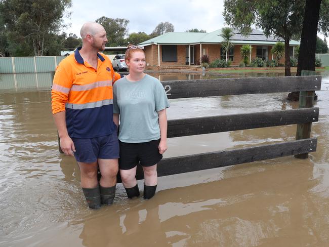 Bendigo residents Alain and Jess Gobbo’s home was surrounded by water more than 30cm deep. Picture: David Crosling