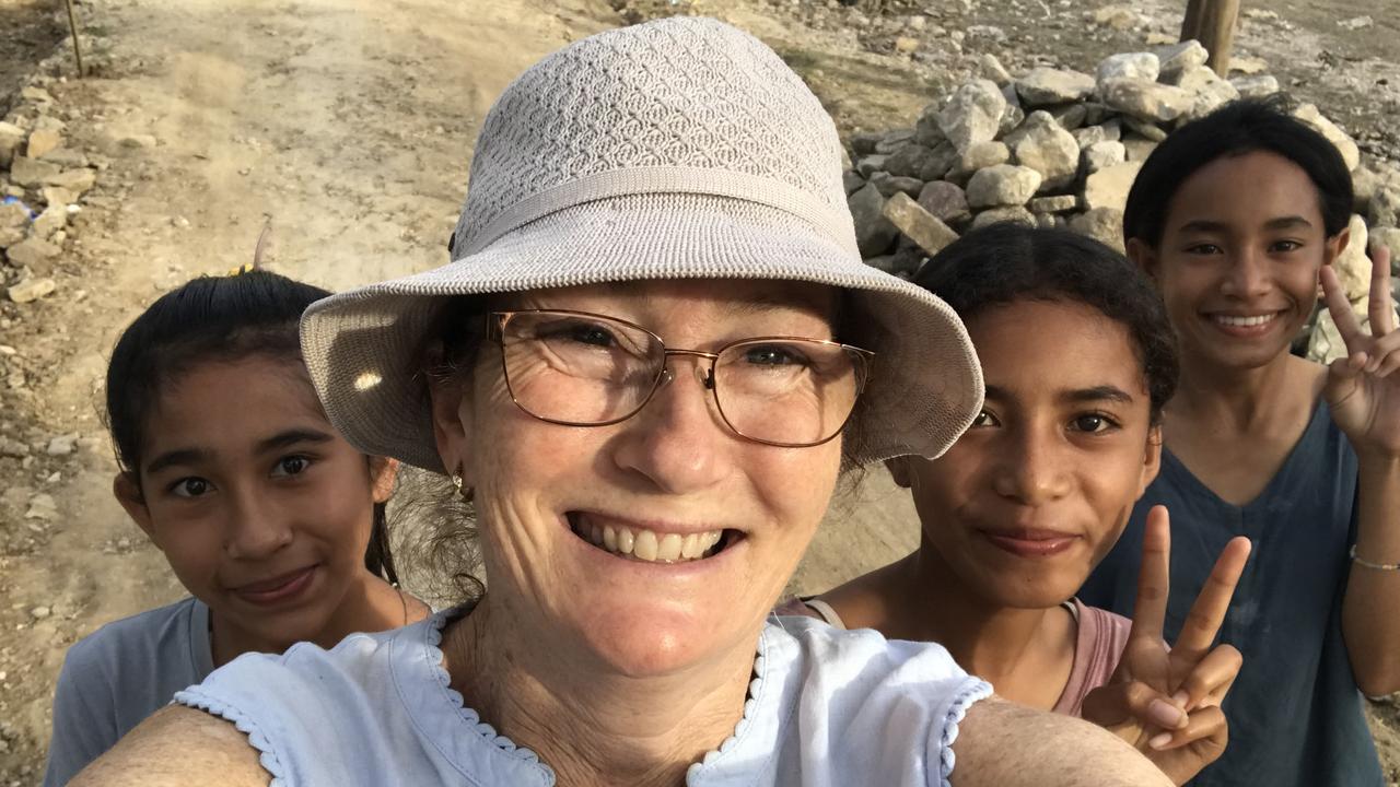 Toowoomba couple and music teachers Madeleine Minns and Malcolm Gaydon have spent nearly a year volunteering in East Timor. The couple have been assisting with education and animal health and are working to raise funds for local schools and hospitals. Picture: Supplied