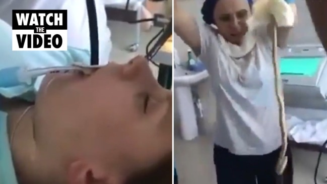Huge snake pulled from woman's mouth