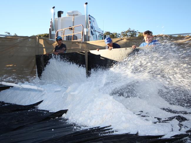 Volunteers help to bring the snow into the Stanthorpe Showgrounds for Snowflakes in Stanthorpe on Friday, June 30.