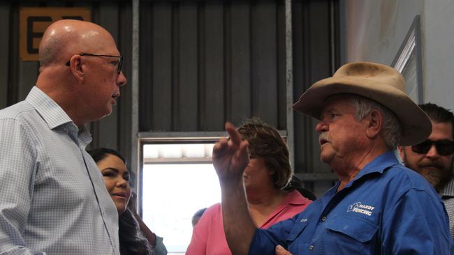 Federal Opposition leader Peter Dutton talks with Ross Engineering and Hardy Fence owner Sydney Maloney at his company's factory in Alice Springs. Picture: Gera Kazakov