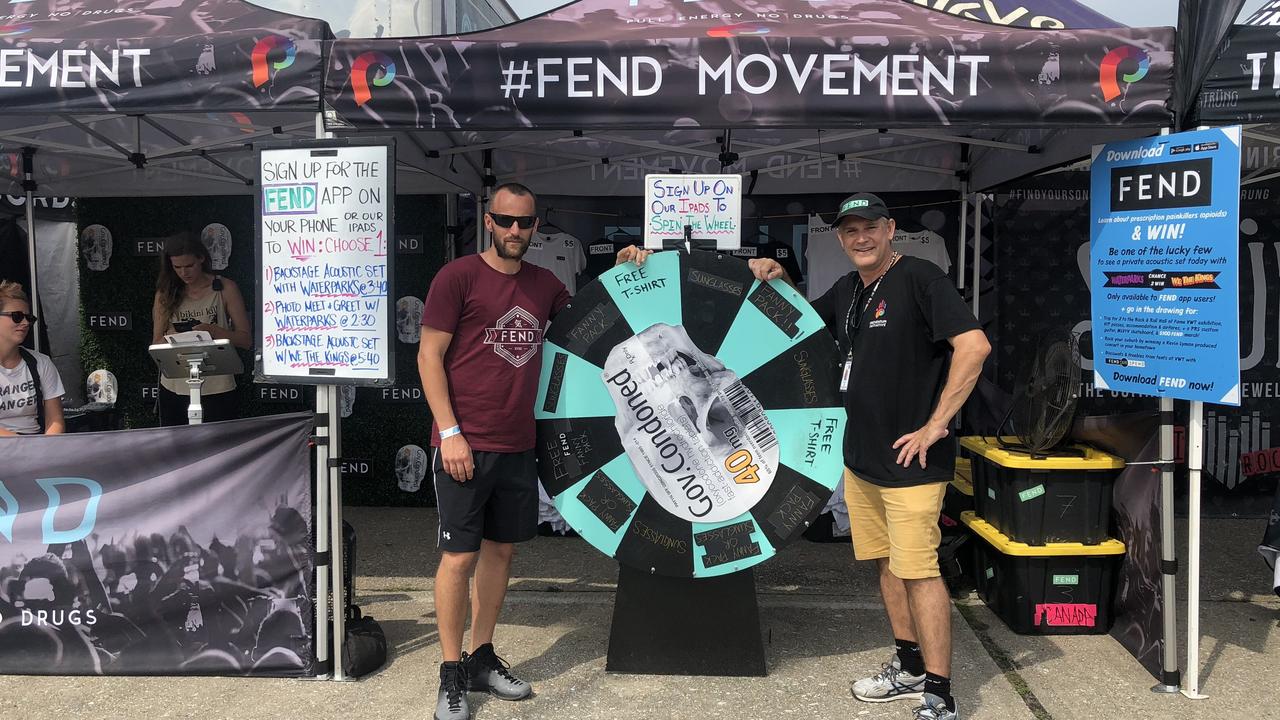 Preventum co-founders Lyndon Holzheimer and Steve Huff man a Full Energy No Drugs stall at the Jones Beach leg of the Vans Warped Tour in New York.