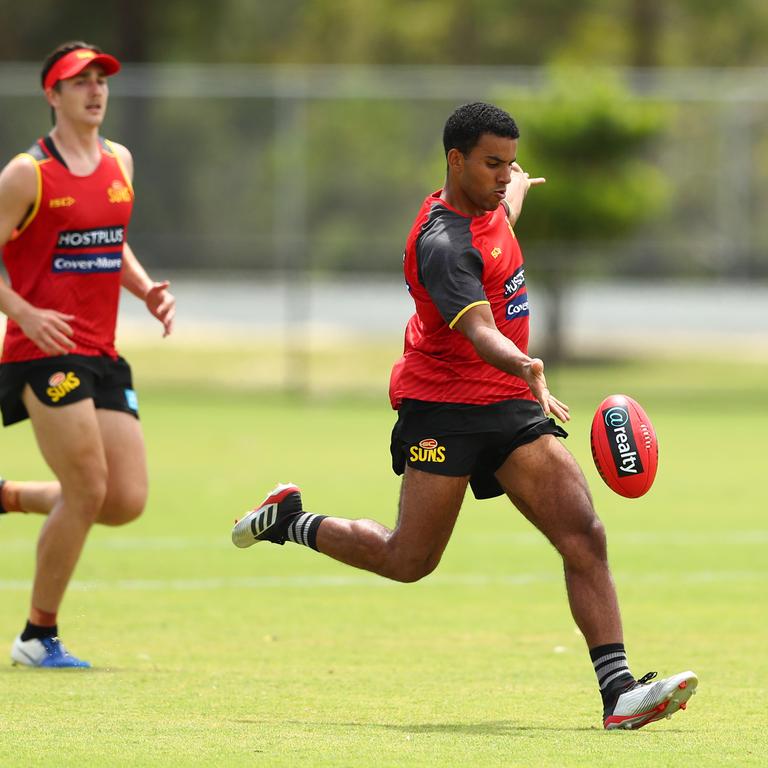 Touk Miller kicks during a Gold Coast Suns AFL media and training session at Metricon Stadium on November 04, 2019 in Gold Coast, Australia. (Photo by Chris Hyde/Getty Images)