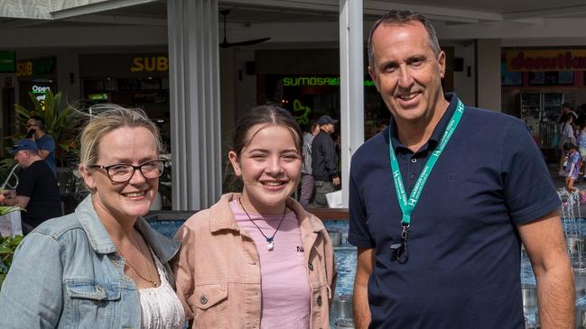 Aurora Iler and her mother Cat Iler thanking  Lewis Land's centre manager of Harbour Town Premium Outlets, Greg Day. Lewis Land are footing the cost of a trip to LA for Aurora and her family to see the premiere of Aurora's short film, Grape. Picture: Ethan Cole