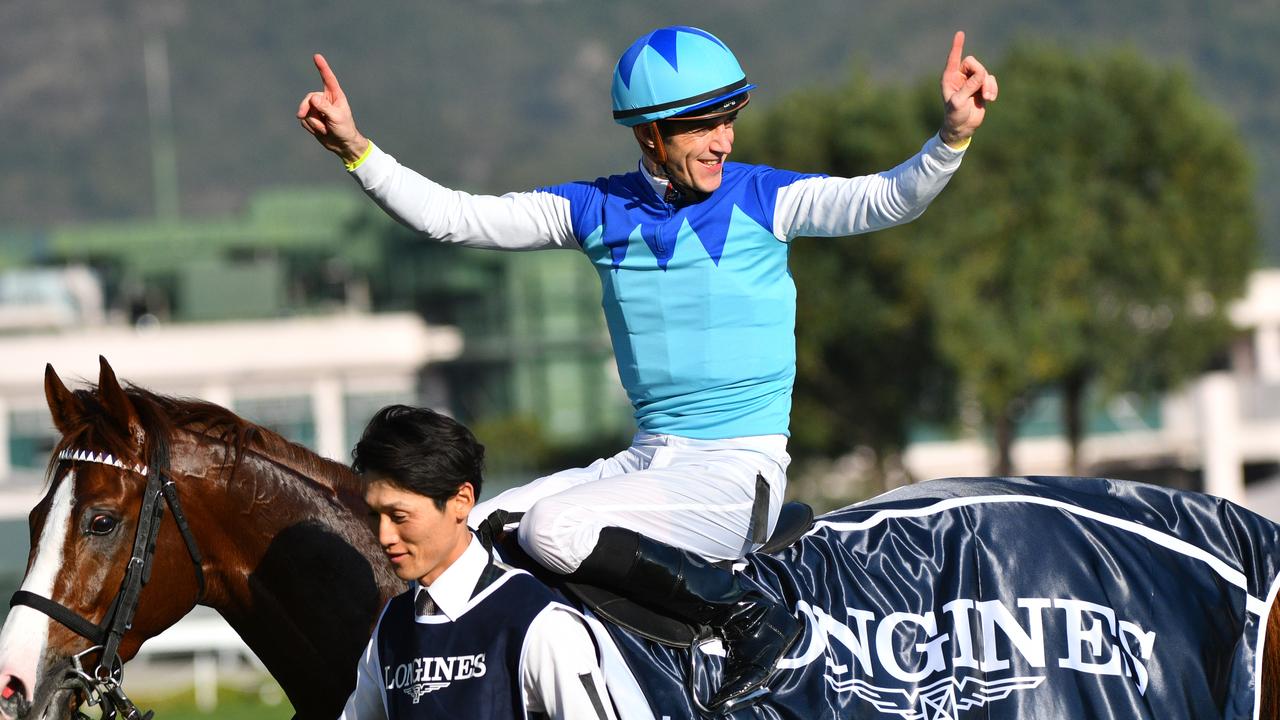 Jockey Christophe Soumillon elbowed a rival in a race. (AAP Image/ Vince Caligiuri)