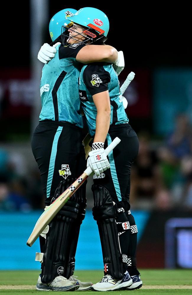 Laura Harris and Jessica Jonassen celebrate Brisbane Heat’s win. Picture: Getty Images