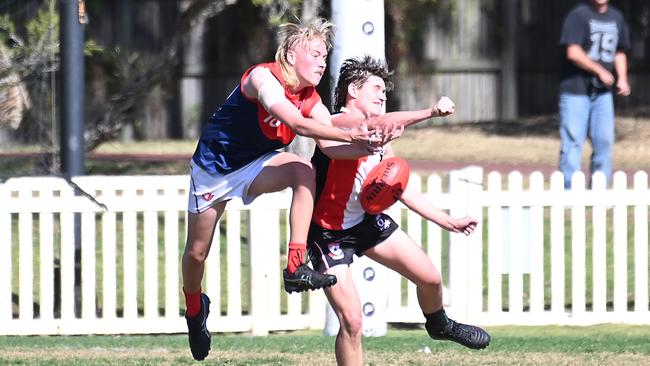 Surfers Paradise player Noah Kidd and Morningside player Thomas Southon. Picture, John Gass