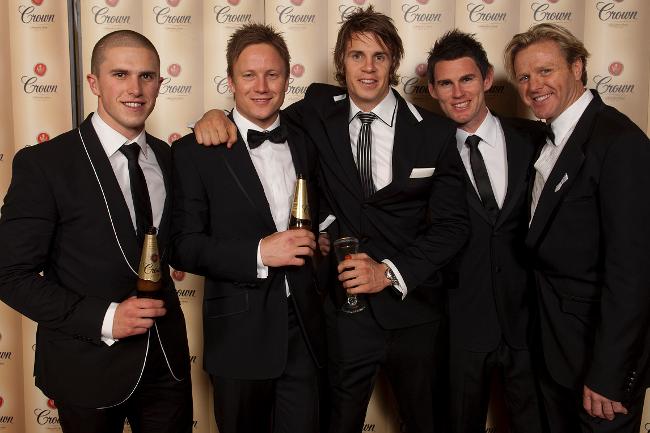 <p>Carlotn's Marc Murphy (left) catches up with Richmond boys Nathan Brown, Brett Deledio and Chris Newman and Dermott Brereton (right) at the Crown Lager Brownlow after party. Picture: Sam D'Agostino</p>