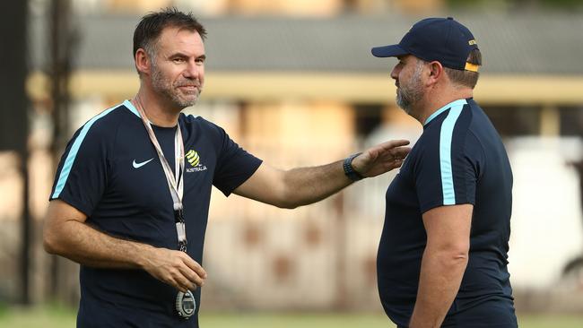 Assistant coach Ante Milicic talks with Socceroos coach Ange Postecoglou.