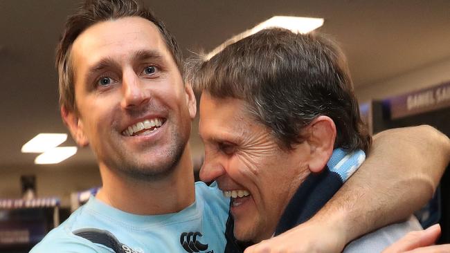 Mitchell Pearce with his father Wayne after the Blues clinched victory in Game 3 of the 2019 Origin series. Picture: Brett Costello