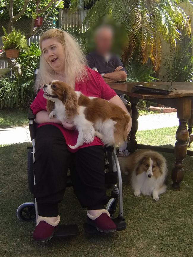 Ann Marie Smith in 2011 with her dogs Maggie and Deana.