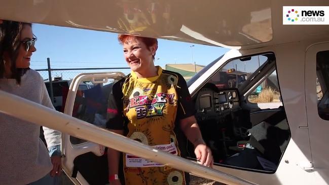 Pauline Hanson camps in a swag under the wings of her plane in Birdsville 