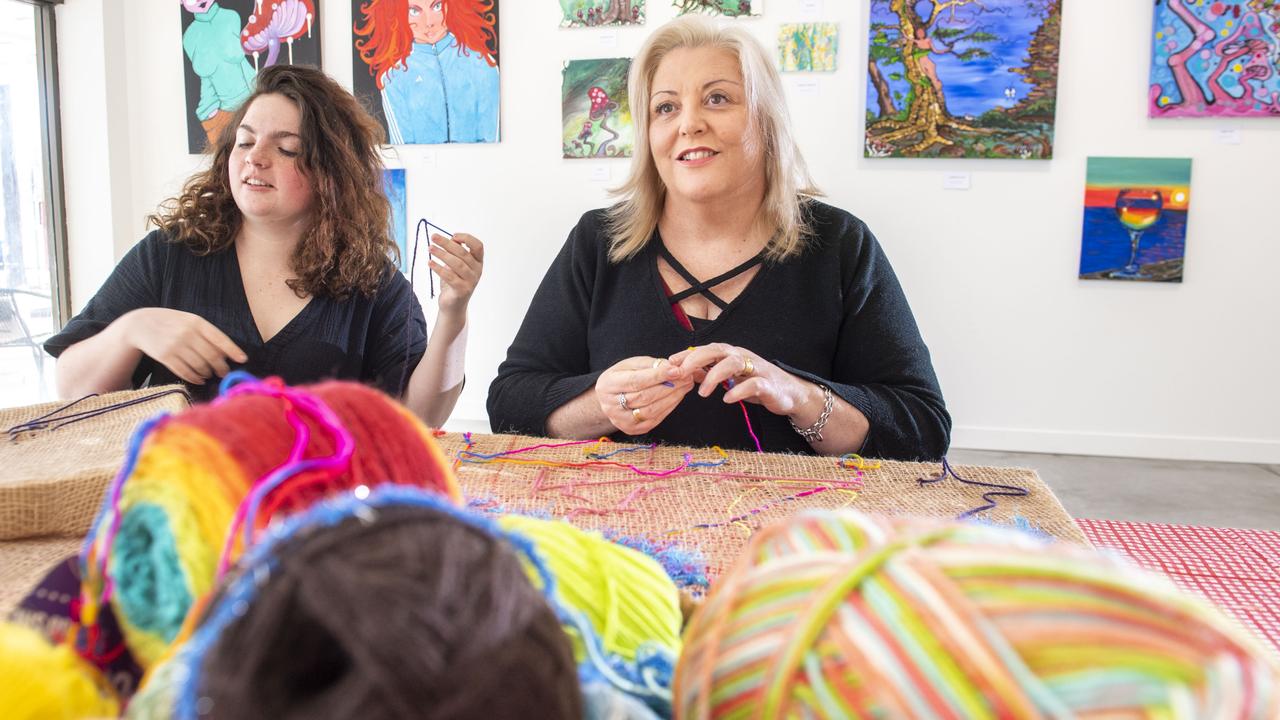 Community members Emma Mort (left) and Kathleen Kelly involved with the community embroidery at The Lighthouse Toowoomba. Thursday, June 23, 2022. Picture: Nev Madsen.