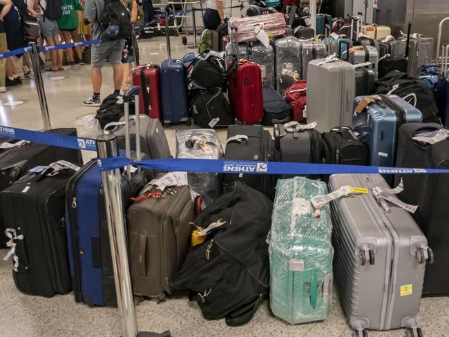 Suitcases and bags which arrived with delay via other flight or uncollected are spotted in a specific area at the baggage belt area after the arrivals of Athens International Airport ATH. Lost and found office faced increased demand of requests specially with connecting - transfer passengers flights in Europe where the luggage workers as others in the aviation sector face staff shortages. The lost luggage cases are also higher than normal. Many European and UK airports cancel flights and have long delays, creating a travel chaos for the aviation industry after the high demand in summer 2022 a season without the Covid-19 Coronavirus pandemic safety measures and travel restrictions. Athens, Greece on August 2022 (Photo by Nicolas Economou/NurPhoto via Getty Images)