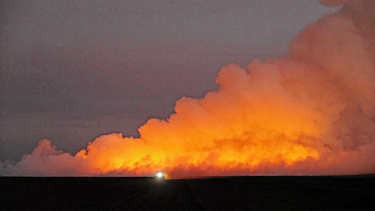 FARM FLAMES: NewsMail photographer Mike Knott took these photos of a cane fire on Windermere Rd, Qunaba. Picture: Mike Knott BUN300719FIRE2