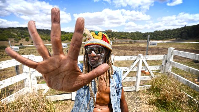 Robert Corowa protests at the site of the North Lismore Plateau development.