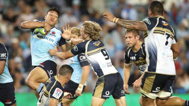 SYDNEY, AUSTRALIA - MARCH 18: Israel Folau of the Waratahs makes a break during the round four Super Rugby match between the Waratahs and the Brumbies at Allianz Stadium on March 18, 2017 in Sydney, Australia. (Photo by Mark Kolbe/Getty Images)