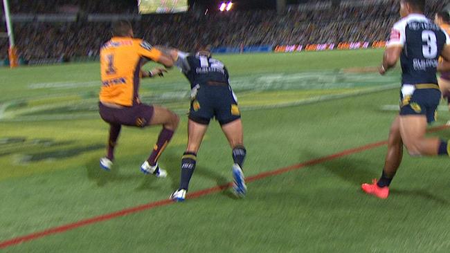 Justin Hodges is hit by Tariq Sims.