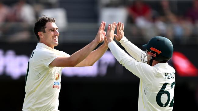 Pat Cummins celebrates taking the wicket of Kagiso Rabada. Picture: Getty