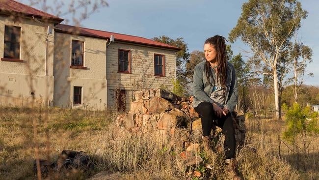 Artist Sally Wilson on the Cobargo block where her studio was destroyed. Picture: Ben Marden