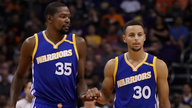 Kevin Durant #35 and Stephen Curry #30 of the Golden State Warriors.