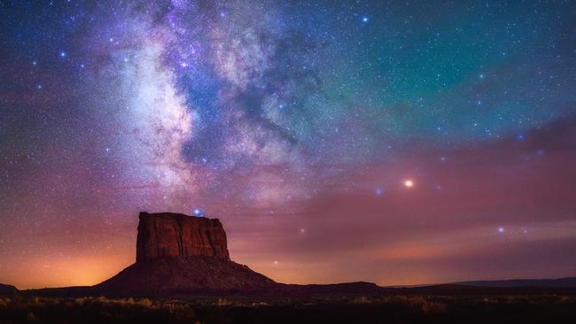 Monument Stars © Albert Dros Despite being taken during the Lunar Eclipse of 2015 the photographer actually didn't shoot the moon, but took the opportunity to capture the amazing dark sky that presented itself. Coming from a country (the Netherlands) with so much light pollution, this marked the first time the photographer had seen the Milky Way so clearly. The red glow in the sky is from the extraordinary atmosphere during the Lunar Eclipse, and the photographer remarked that it was, ‘An experience I will never forget.’ This shot is a panorama comprised of 3 vertical shots. Monument Valley, United States