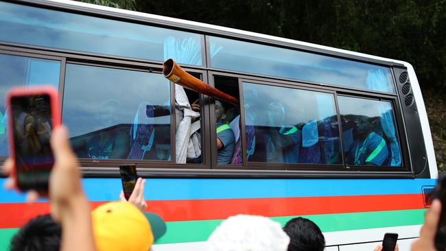 Kurtley Beale plays a didgeridoo from the Wallabies’ team bus. Photo: Dan Mullan/Getty Images