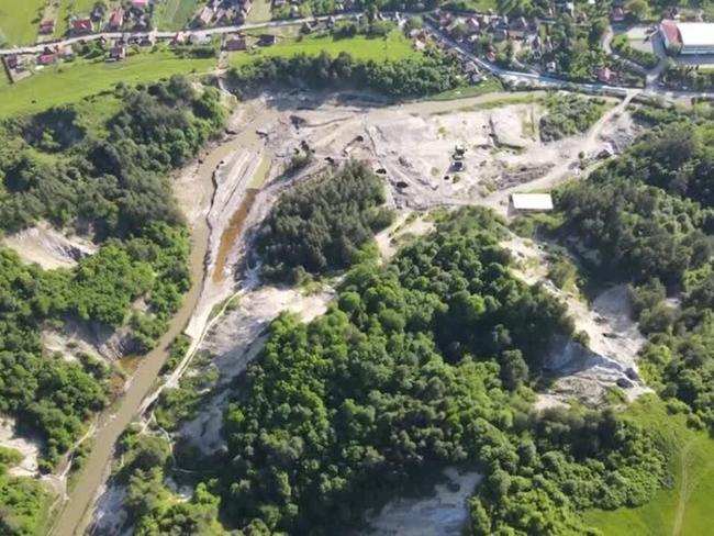 Romanian officials reroute flooded stream away from Praid salt mine