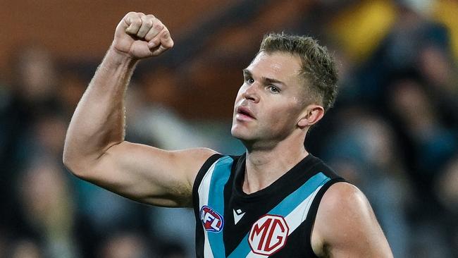 ADELAIDE, AUSTRALIA - AUGUST 03: Dan Houston of the Power  celebrates a goal  during the round 21 AFL match between Port Adelaide Power and Sydney Swans at Adelaide Oval, on August 03, 2024, in Adelaide, Australia. (Photo by Mark Brake/Getty Images)