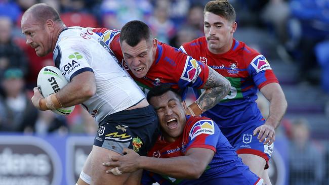 Matthew Scott taking on the Knights in Newcastle last Saturday. The Cowboys forward suffered a stroke just 24 hours later. Picture: AAP/Darren Pateman