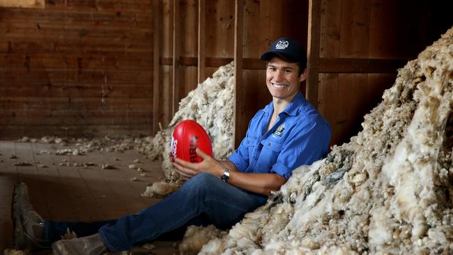 Far from home: Timm House, picked up by Geelong in the 2016 draft and yet to make his AFL debut, works on a small farm outside Geelong. He grew up on a cropping farm in Western Australia, but was recruited from GFL club Newtown and Chilwell and the VFL. Picture: Andy Rogers