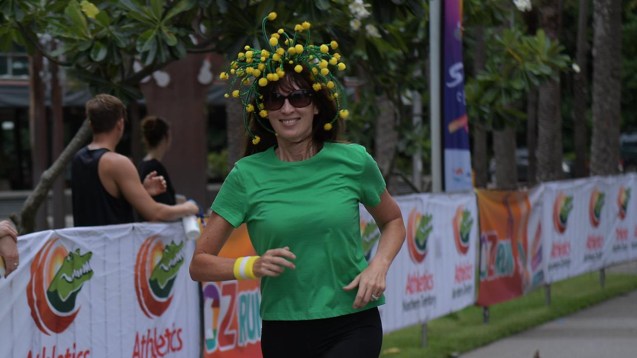 Runners come through the finish line at the Australia Day 2023 at Darwin Waterfront. Picture: (A)manda Parkinson