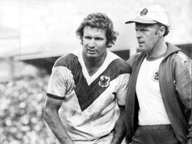 Captain Graeme Langlands is assisted from the field with a leg injury. Picture: News Corp Archive.