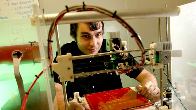 Print Manager Callum Cameron using 2D printer parts to make 3D printers at Substation 33, Kingston - Picture: Richard Walker