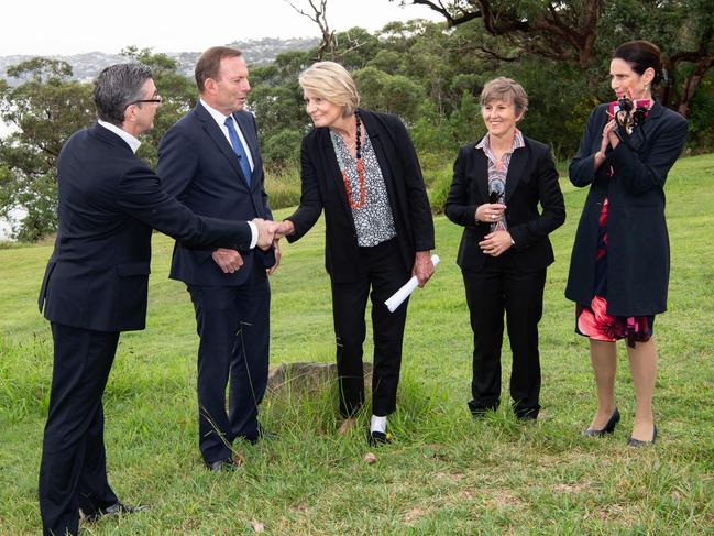 Tony Abbott with (form left) Joseph Carozzi chair Sydney Harbour Federation Trust, Jill Lestrange vice president the headland preservation group, Mary Darwell CEO Sydney Harbour Federation Trust and Mosman Mayor Carolyn Corrigan in April when he announced the cash for Federation Trust. Picture: Monique Harmer