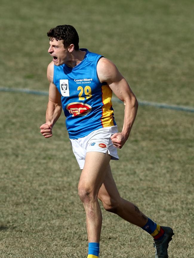 Chris Burgess of the Suns celebrates kicking a goal during the First VFL semi final between the Sydney Swans and the Gold Coast Suns. Picture: Jason McCawley/AFL Photos/via Getty Images.